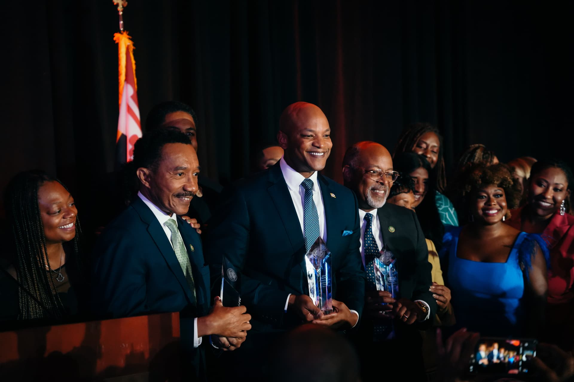 Award ceremony honorees on stage at a Maryland gala